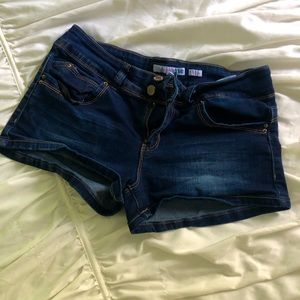 Size 9 SUPER STRETCHY mid rise dark wash shorts